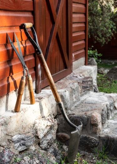 gardener-tools-beside-house